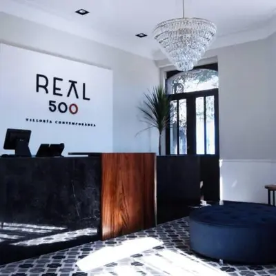Cama o camas de una habitación en Hotel Business Real 500