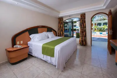 Cama o camas de una habitación en Hotel Costa Azul