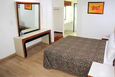 Cama o camas de una habitación en Hotel Princesa