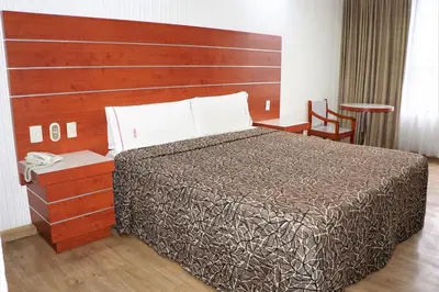 Cama o camas de una habitación en Hotel Princesa