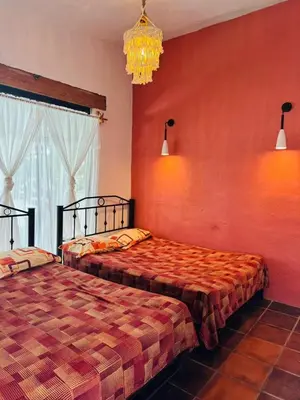 Cama o camas de una habitación en La Loma del Cardenal