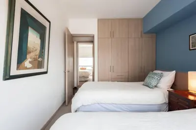 Cama o camas de una habitación en Parque Sur Beautiful apartment 2 BE - 2 BA - 2 Parkings
