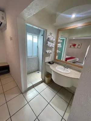 Un baño de Hotel Arcos Aeropuerto