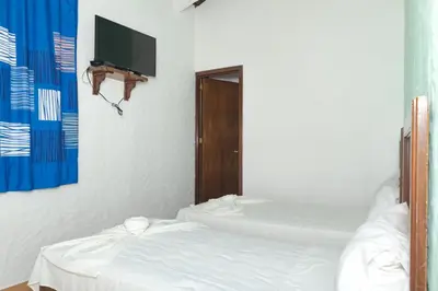 Cama o camas de una habitación en Hotel OM Tangolunda