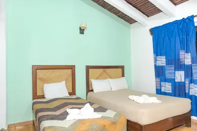 Cama o camas de una habitación en Hotel OM Tangolunda