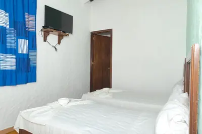 Cama o camas de una habitación en Hotel OM Tangolunda