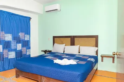 Cama o camas de una habitación en Hotel OM Tangolunda