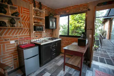 Una cocina o zona de cocina en Barro Negro by Majikal B&B
