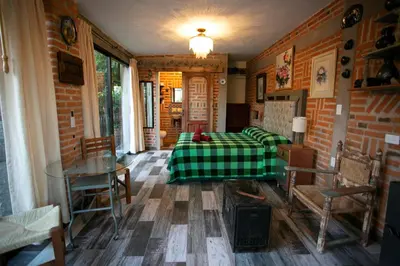Cama o camas de una habitación en Barro Negro by Majikal B&B