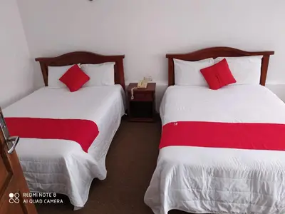 Cama o camas de una habitación en Hotel Montecarlo