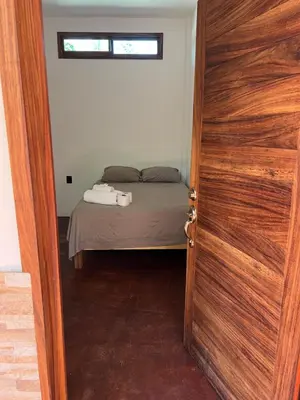 Cama o camas de una habitación en Cabañas las Palmas Chacahua