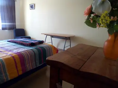 Cama o camas de una habitación en Posada San José, Hotel