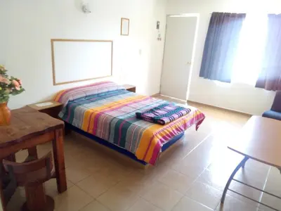 Cama o camas de una habitación en Posada San José, Hotel