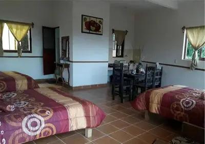 Cama o camas de una habitación en Posada Acaxiloco