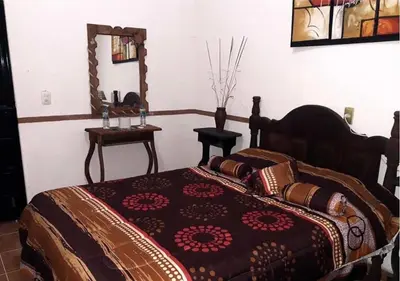 Cama o camas de una habitación en Posada Acaxiloco