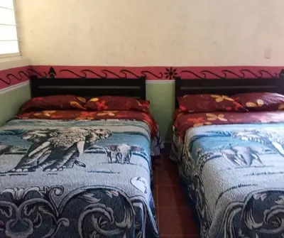 Cama o camas de una habitación en El Portón de Cortés