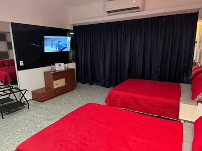 Cama o camas de una habitación en Suite VIP frente al mar en el corazón de Acapulco
