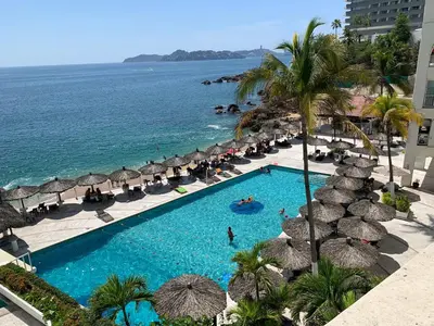 Piscina en o cerca de Suite VIP frente al mar en el corazón de Acapulco