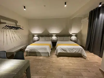 Cama o camas de una habitación en Capital Suites