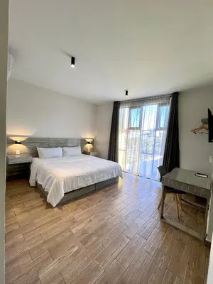 Cama o camas de una habitación en Capital Suites