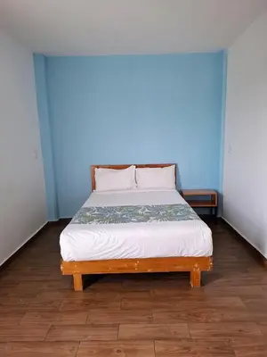 Cama o camas de una habitación en Hostal Tres Central
