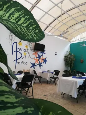 Un restaurante o sitio para comer en Hotel Arenas del Pacifico
