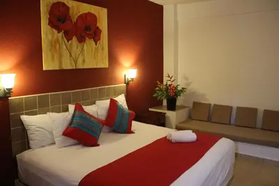 Cama o camas de una habitación en Hotel Arenas del Pacifico