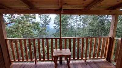 Un balcón o terraza de Cabaña en el Bosque de San José del Pacífico