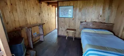 Cama o camas de una habitación en Cabaña en el Bosque de San José del Pacífico