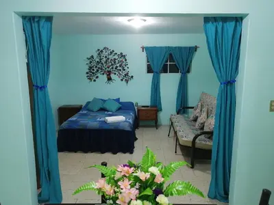 Cama o camas de una habitación en DEPARTAMENTO CERCANO AL AEROPUERTO T2, A 2 CALLES