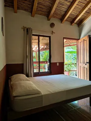 Cama o camas de una habitación en Casa H Rinconcito Mazunte