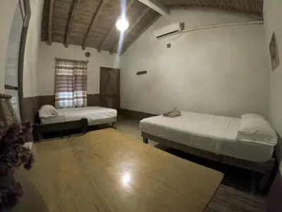 Cama o camas de una habitación en Casa H Rinconcito Mazunte