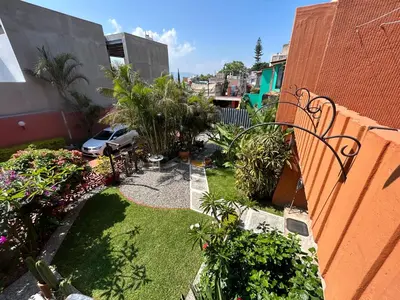 Jardín al aire libre en Casa de las Palmas Guest House