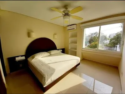 Cama o camas de una habitación en Suite Club Deportivo