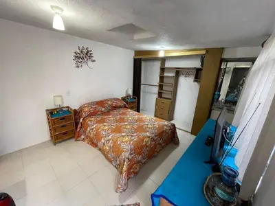 Cama o camas de una habitación en Departamento Naval Coyoacán