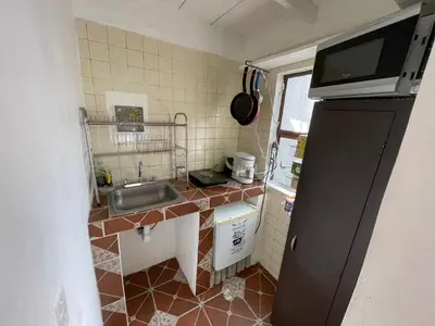 Una cocina o zona de cocina en Departamento Naval Coyoacán