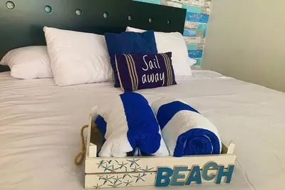Cama o camas de una habitación en Loft con vista al mar y acceso a playa