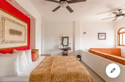 Cama o camas de una habitación en HOTEL VILLAS XAIBA