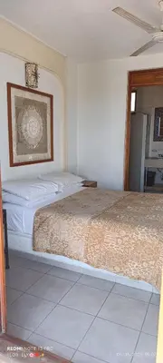Cama o camas de una habitación en HOTEL VILLAS XAIBA