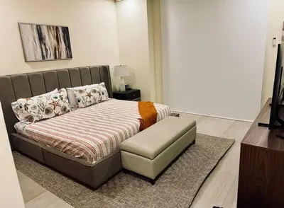 Cama o camas de una habitación en Luxurious First-Floor Apartment in Isla Residences