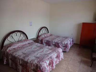 Cama o camas de una habitación en Hotel Del Centro