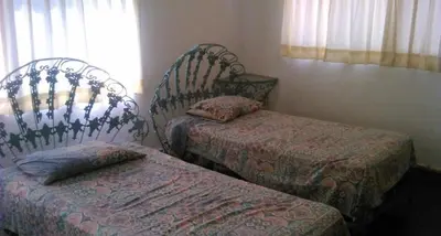 Cama o camas de una habitación en Casa del trébol