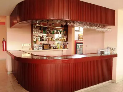El salón o zona de bar de Hotel Siesta del Sur