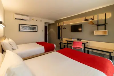Cama o camas de una habitación en City Express by Marriott Salina Cruz