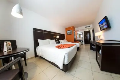 Cama o camas de una habitación en HOTEL OLIBA Boca del Rio