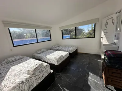 Cama o camas de una habitación en Finca El Quijote con alberca y 6 cuartos