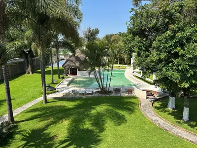 Piscina en o cerca de Finca El Quijote con alberca y 6 cuartos