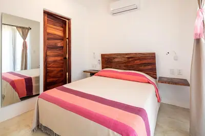 Cama o camas de una habitación en Casa Kuaa