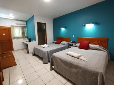 Cama o camas de una habitación en Los Ciruelos Oaxaca
