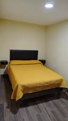 Cama o camas de una habitación en Posada Tres Marías Un rincón de Magia Zacateca.